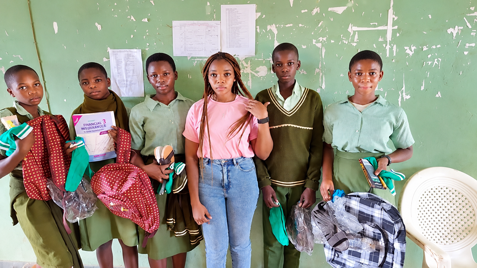 Students with School Supplies in Classroom